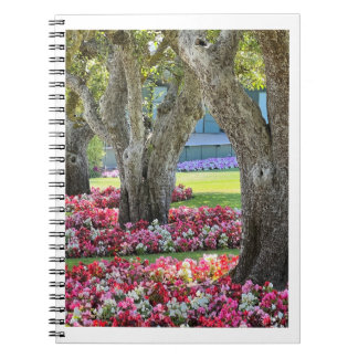Flower garden with trees photo spiral notebook