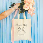 Flower Girl | Choose any Colour Coquette Bow Tote Bag<br><div class="desc">This stylish,  whimsical tote says "Flower Girl" in chic,  handwritten script with an illustrated coquette bow and a spot for her name. You can customize the tote by choosing any colour for the text and bow,  so your bridal wedding party can match.</div>