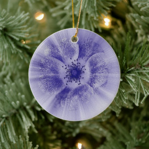 Flower in blue ceramic ornament