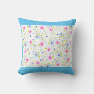 FLOWERED throw pillow in light blue.
