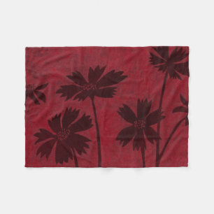 Flowerhead Silhouettes on Crimson Background Fleece Blanket