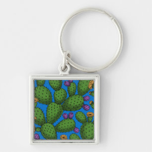 Flowering opuntia on blue keychain