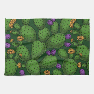 Flowering opuntia on dark green kitchen towel