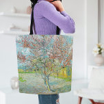 Flowering Peach Tree | Vincent van Gogh Tote Bag<br><div class="desc">Flowering Peach Tree (1888) by Dutch post-impressionist artist Vincent van Gogh. Original artwork is an oil on canvas depicting a beautiful landscape of blossoming pink trees.

Use the design tools to add custom text or personalize the image.</div>