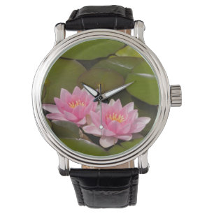 Flowering water lilies watch