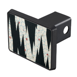 Flowers on a footpath trailer hitch cover