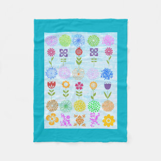 Flowers on blue fleece blanket