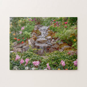 Flowing Waterfall with spring flowers Jigsaw Puzzle