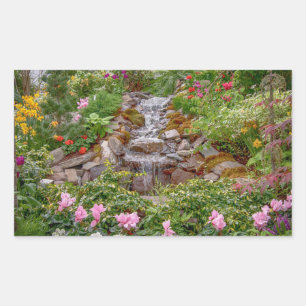 Flowing Waterfall with spring flowers Sticker
