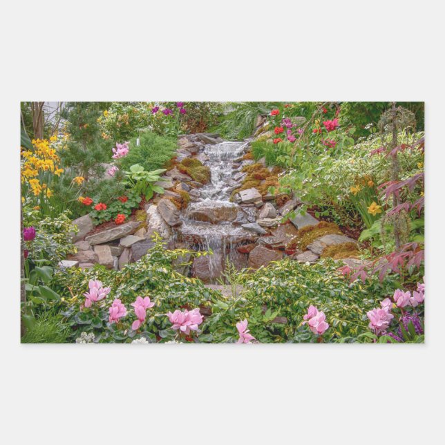Flowing Waterfall with spring flowers Sticker (Front)