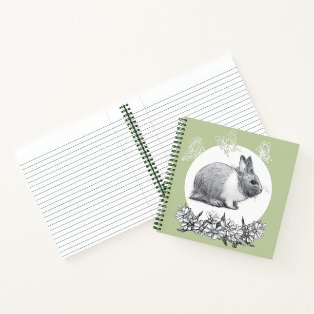 Fluffy hare with butterflies on green background notebook (Inside)