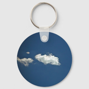 Fluffy white cloud on deep blue sky keychain