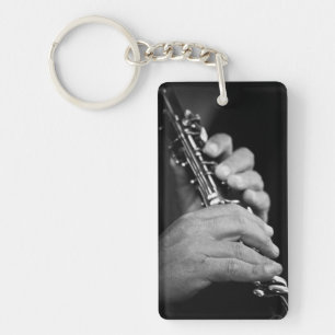 Flute being played in black and white by gypsy keychain