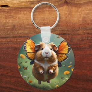 "Flutter Paws: The Guinea Pig Takes Flight" Keychain