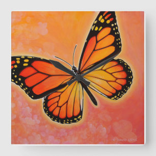 Fluttering Monarch butterfly clock