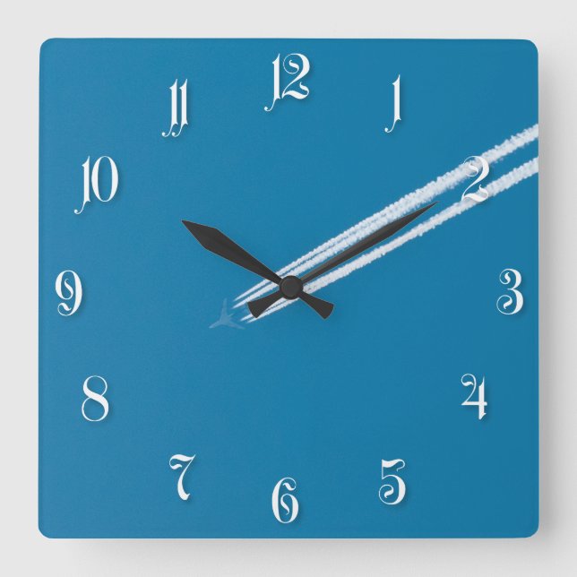 Flying airplane on a blue sky background square wall clock (Front)