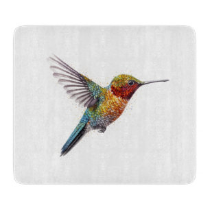Flying colourful hummingbird in watercolor cutting board