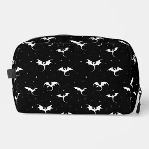 Flying dragons and stars on black background dopp kit