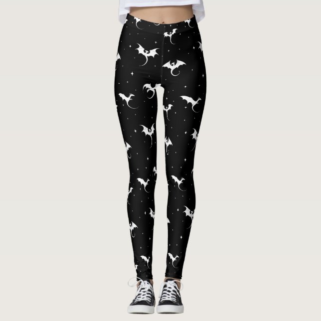 Flying dragons and stars on black background leggings (Front)