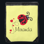 Flying heart ladybug kids name red drawstring bag<br><div class="desc">Cute ladybug / ladybird flying with hearts graphic art named kids bag in red,  black,  white and yellow. Ideal for trips out sleep overs or to take to school. Personalize with your own name,  currently reads Miranda. Original graphic ladybug art by Sarah Trett.</div>