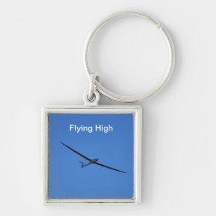 Flying high in the sky keychain