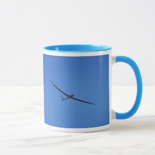 Flying high in the sky mug