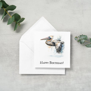 Flying pelican in watercolor, customizable holiday card