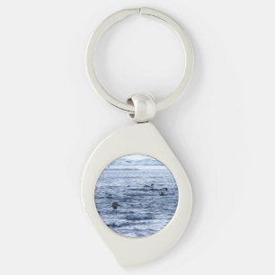 Flying penguin keychain