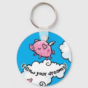 Flying pig dances on clouds keychain