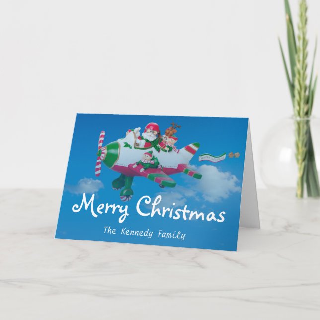 Flying Santa Claus with Elves in Airplane Holiday Card (Front)