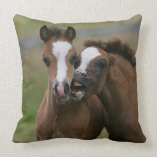 Foals Playing Throw Pillow