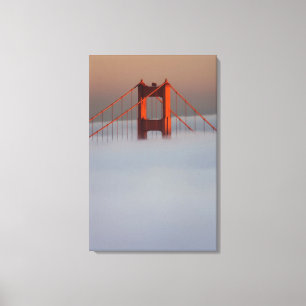 Fog rolls through the San Francisco bay covering 2 Canvas Print