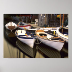 Fog surrounds four boats docked. poster