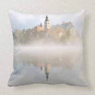 Foggy sunrise at Lake Bled Throw Pillow