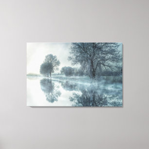 Foggy Winter Scene of a Lake, with Trees, and Sky Canvas Print