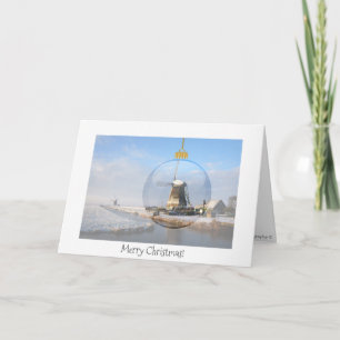 Folded christmas card with glass ball and windmill