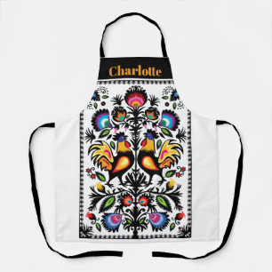 Folklore avec tablier de coqs