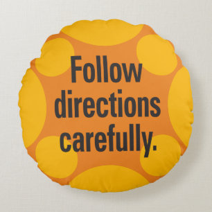Follow directions carefully Orange Spots Round Pillow