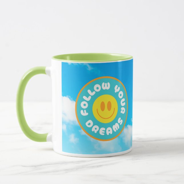 Follow your dreams happy face mug w green handle (Left)