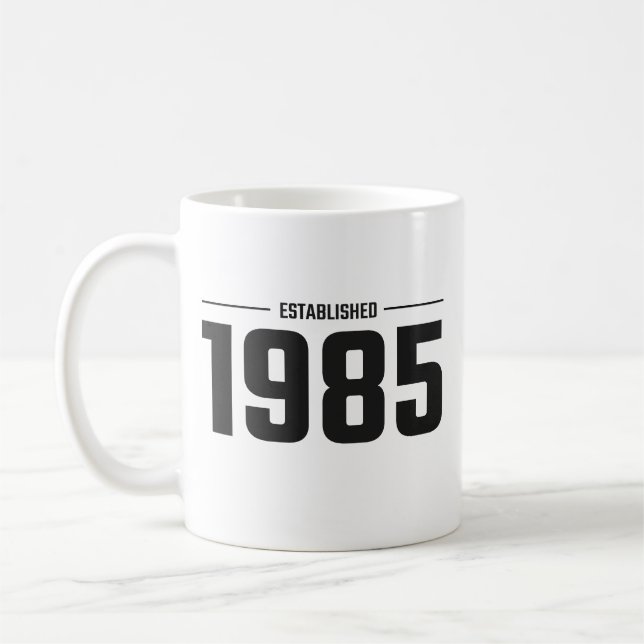Fondée en 1985 Coffee Mug (Gauche)