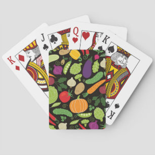 Food on a black background playing cards