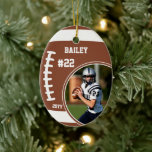 Football Name Jersey Number Photo Keepsake Ceramic Ornament<br><div class="desc">This design features a football background with space for a name, number and photo. Click the customize button for more flexibility in adjusting the text! Variations of this design as well as coordinating products are available in our shop, zazzle.com/store/doodlelulu. Contact us if you need this design applied to a specific...</div>