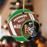Football Name Jersey Number Photo Keepsake Ceramic Ornament<br><div class="desc">This design features a football background with space for a name, number and photo. Click the customize button for more flexibility in adjusting the text! Variations of this design as well as coordinating products are available in our shop, zazzle.com/store/doodlelulu. Contact us if you need this design applied to a specific...</div>