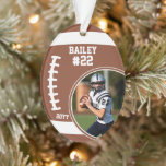 Football Player Name Number Photo Keepsake Ornament<br><div class="desc">This design features a football background with space for a name, number and photo. Click the customize button for more flexibility in adjusting the text! Variations of this design as well as coordinating products are available in our shop, zazzle.com/store/doodlelulu. Contact us if you need this design applied to a specific...</div>