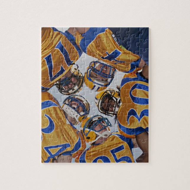 Football players in huddle jigsaw puzzle (Vertical)