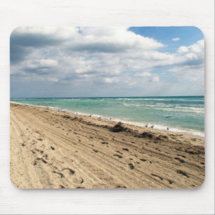 Footprints and ocean mouse pad