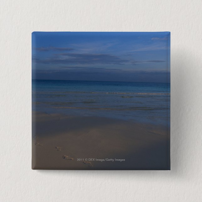 Footprints on beach 2 inch square button (Front)