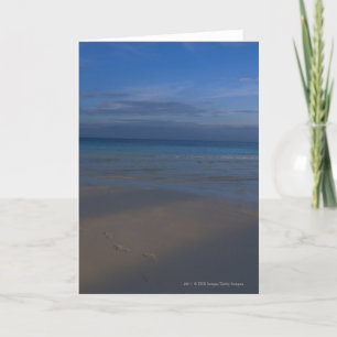 Footprints on beach card