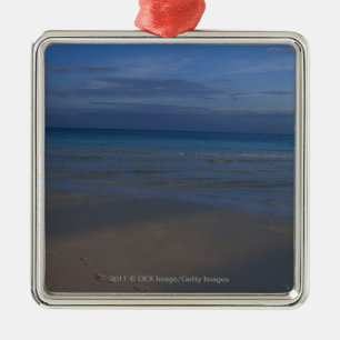 Footprints on beach metal ornament