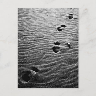 Footprints on the sand postcard